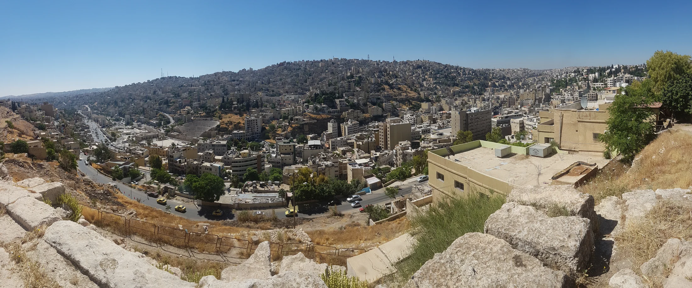 Panoramic view across the hills and dense cityscape of Amman, Jordan