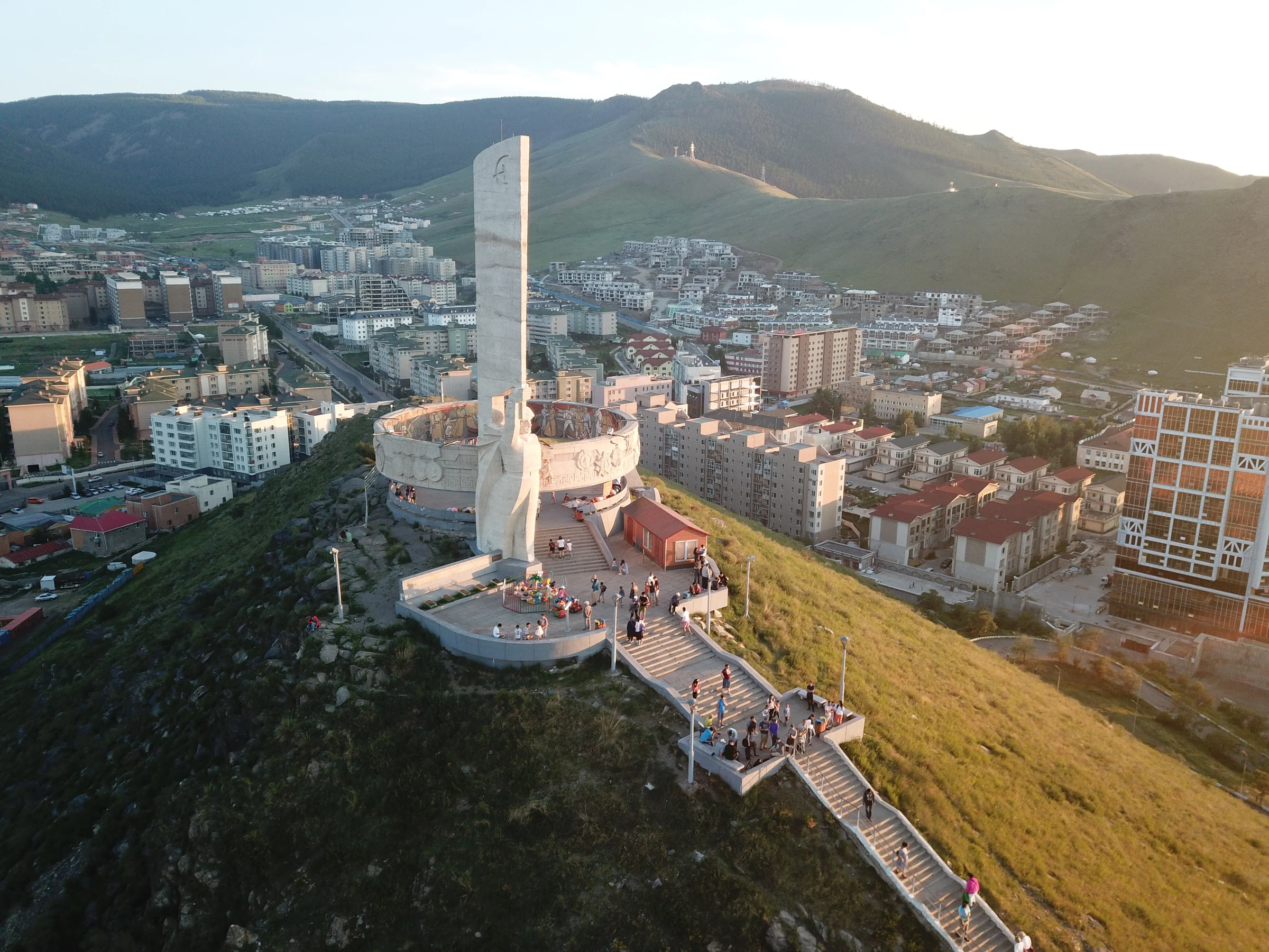 Aerial view of the Zaisan Memorial and surrounding hills in Ulaanbaatar, Mongolia at golden hour